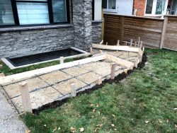 1 patriarch-construction-calgary-concrete-contractors-bridgeland-exposed-aggregate-sidewalk-staircase-during-1