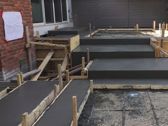 3-patriarch-construction-calgary-concrete-contractors-willowfern-patio-staircase-during-3