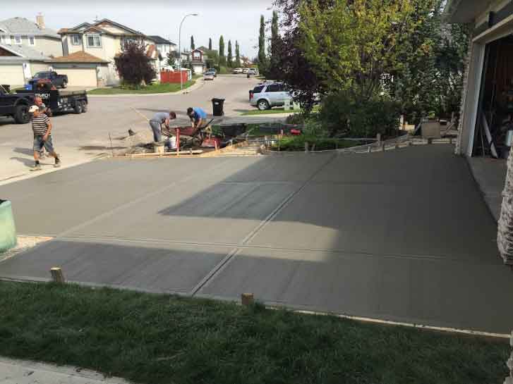 4-patriarch-construction-calgary-concrete-contractors-royal-oak-driveway-brushed-finished-stamped-patio-after