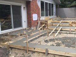 4-patriarch-construction-calgary-concrete-contractors-willowfern-patio-staircase-during-1