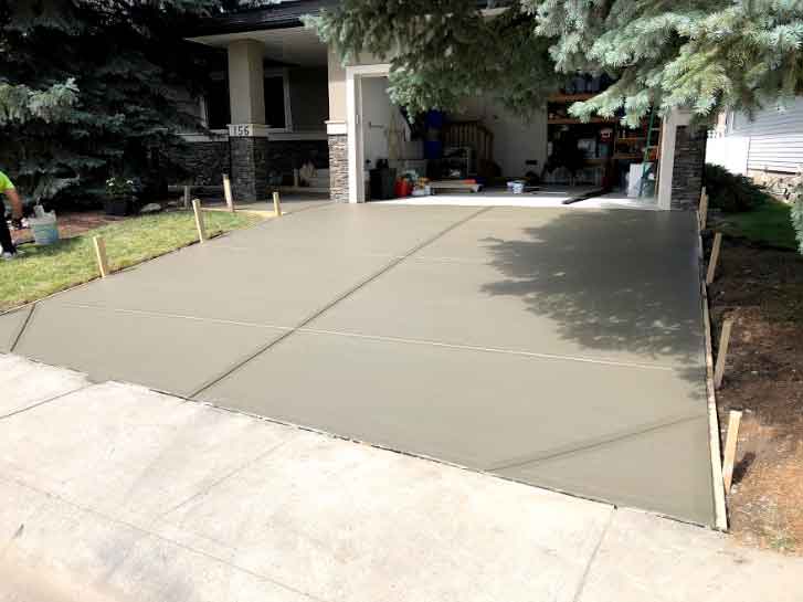5-patriarch-construction-calgary-concrete-contractors-oakridge-driveway-brushed-sidewalk-after